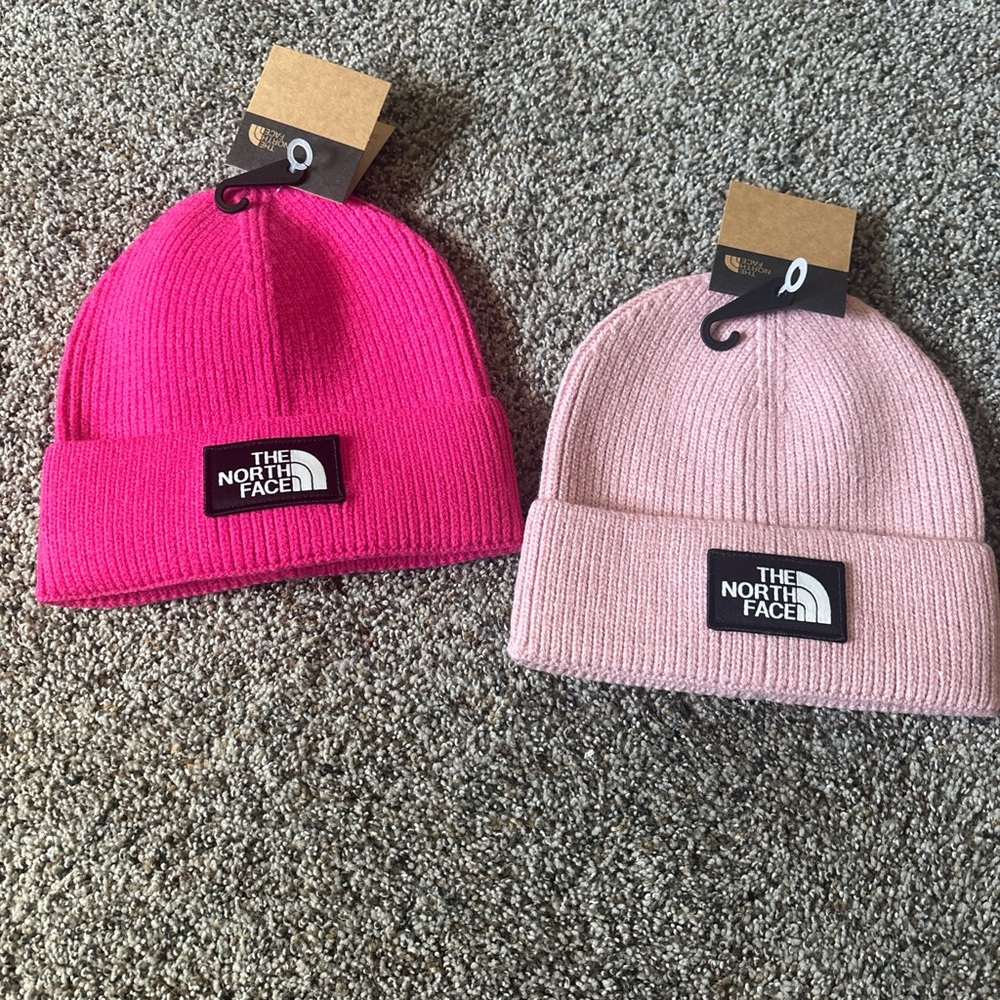 The North Face girly Valentine’s Day fuchsia hot pink and light pink beanies